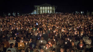 Candlelight March for peace, acceptance and inclusion on UVA Lawn near the rotunda at nighttime