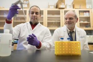 William Petri and Mahmoud Saleh in lab