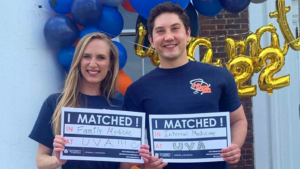 UVA School of Medicine, MD Program Match Day Celebrations 2022 couple showing match results cards