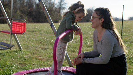 Mother and daughter on playground - Gene Therapy Story