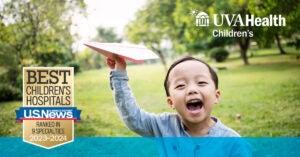 little boy with plane UVA Children's #1 best children's hospital