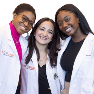 Laiba Murad in center with 2 medical students