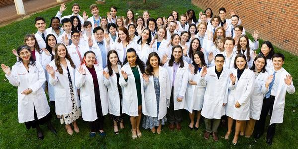 BIMS Students Receive Their First Lab Coats - Featured - Medicine in Motion News