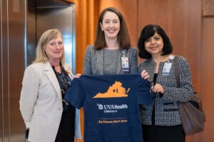 (From left) Karin Skeen, PhD, UVA Health Children's Administrator; Melina Kibbe, MD, School of Medicine Dean; Madhusmita Misra, MD, Department of Pediatrics Chair