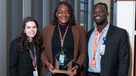 Chioma Moneme (center) award winner at TDIC conf. 2025