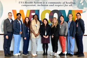 (l-r) Department Chair Colin Derdeyn, MD; UVA Global Health Leadership Track residents Vatsal Lal, MD, and Julia Kariher, MD; visiting resident Catherine Kavishe; GHLT Program Director Jenni Pierce, MD; UVA Global Health Leadership Track residents Olivia Richardson, MD, George Cheeseman, MD, Andrew Westberry, MD, and Connor Sleeth, MD