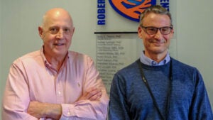 (From left) Ken Walsh, PhD, and Ariel Polizio, PhD