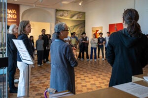 Students at Fralin Art Museum looking at art.