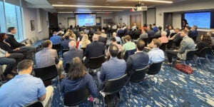 Bobby Chhabra, MD, kicks off the conference Friday morning to a packed Wang Conference Room.