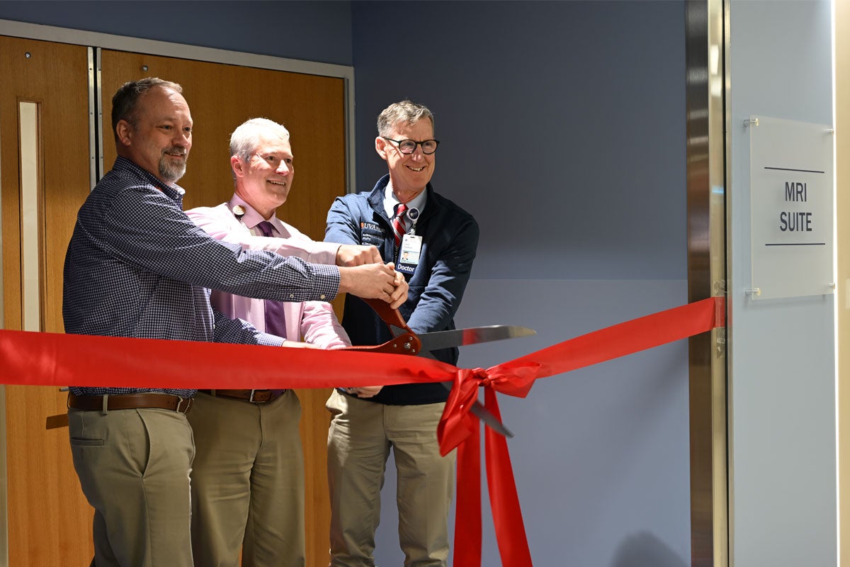 UVA Radiology’s Rich Hooper; James Carnes; and Colin Derdeyn, MD, at the ribbon cutting ceremony celebrating the new MRI suite expansion at University Medical Center.