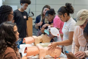 UVA Health Day Camp introducing local youth to careers in medicine.