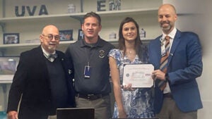 (From left) Chuck Boles, MA, Professor of Justice Studies, Department of Defense ESGR Ombudsman; Brendan Byrne, MD, Department of Emergency Medicine (nominating faculty member, Captain, Medical Core, US Navy Reserves); Anna Beth Muck (daughter of Dr. Muck); and Andrew E. Muck, MD, MBA, (Professor and Chair, Department of Emergency Medicine, Air Force Veteran)