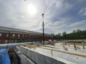 The first steel column was set on April 21, 2025 at the South Tower. (Photo by Skanska USA, Inc.)