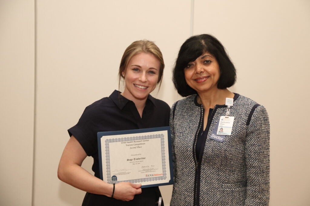 Trainee Competition 2nd Place winner Sage Timberline with Dr. Misra