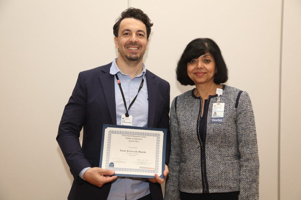 Trainee Competition 4th Place winner Lucas Ferreira de Almeida with Dr. Misra