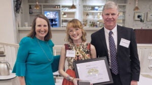 Sage Royston (center), recipient of the 2025 Bowman Scholarship.