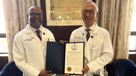 (From left) Arun Krishnaraj, MD, MPH, and Alan Matsumoto, MD
