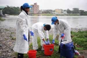 icddr.b researchers collecting sewage water for testing
